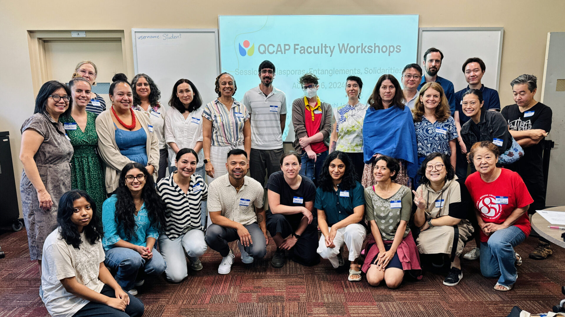 A group photo of twenty QC faculty who were participants at the 2024 QCAP Faculty Workshop.